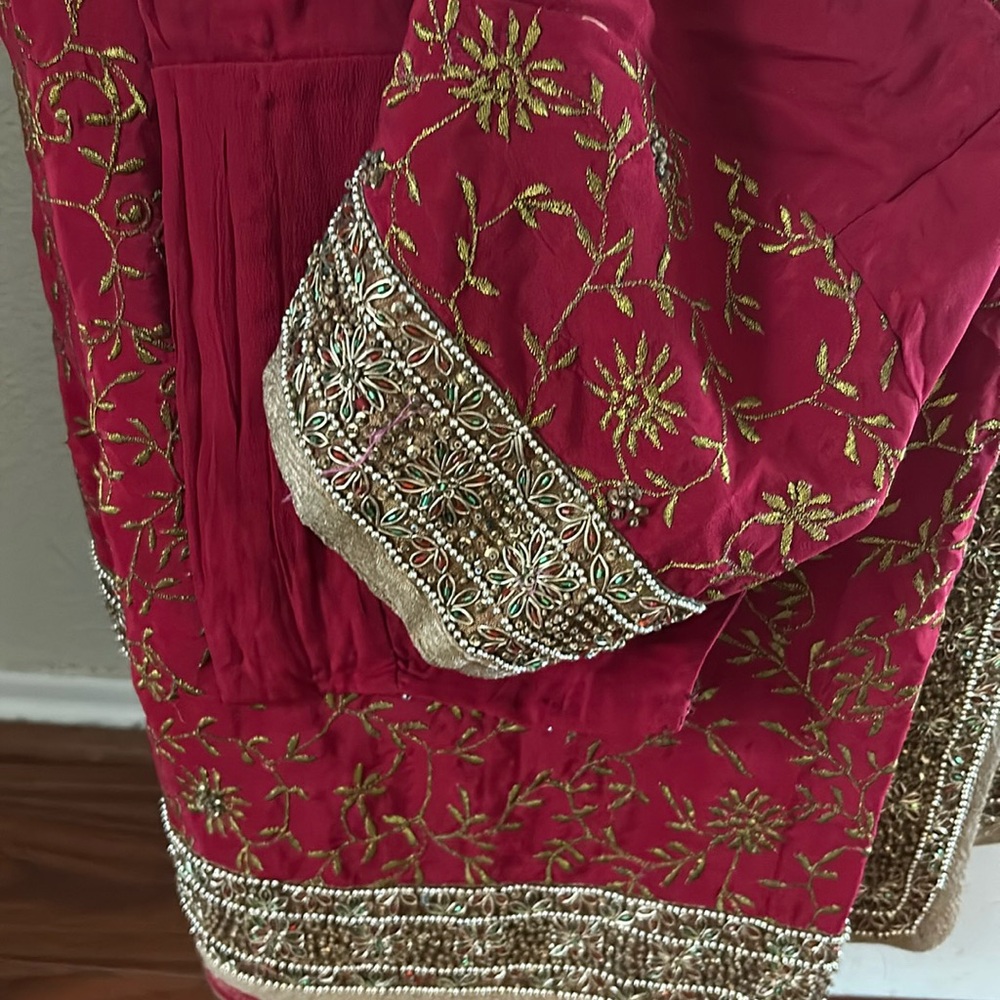 Beautiful red saree heavy work beads and stone
